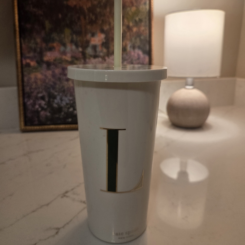 kate spade Cream Tumbler with Gold Letter and White Straw.